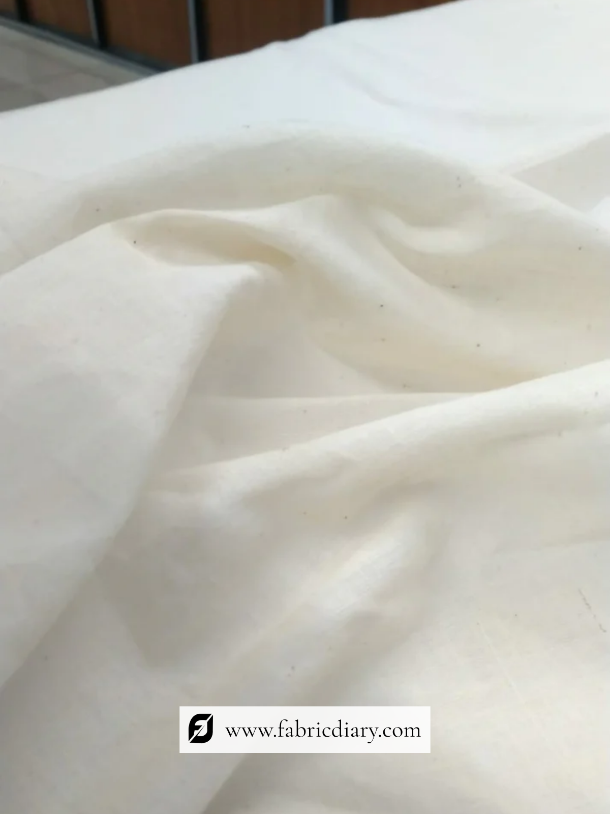 Soft off-white Kora cotton fabric for tailoring