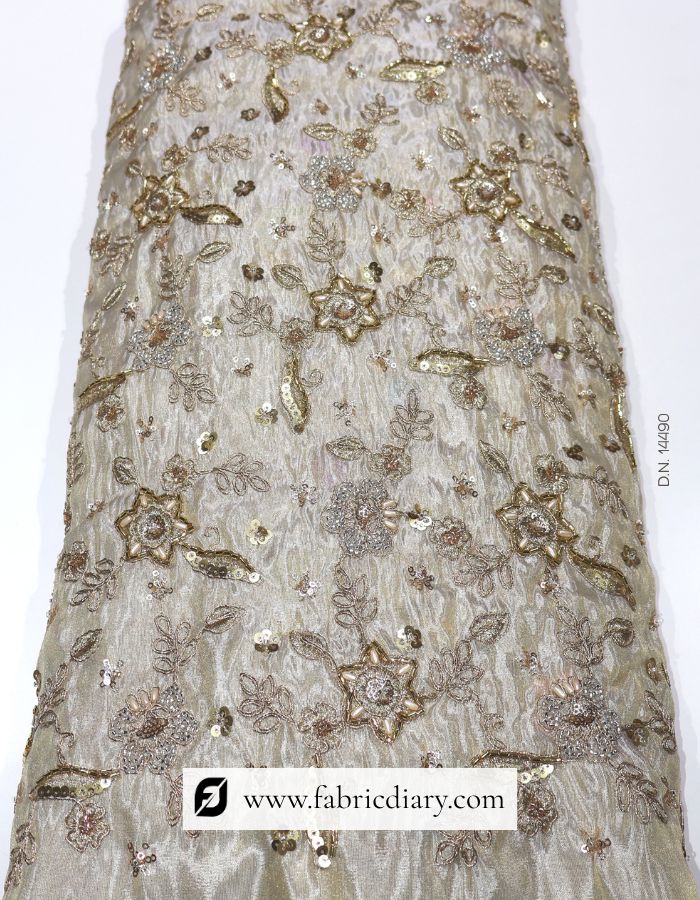 Dyeable floral embroidered fabric on gold tissue