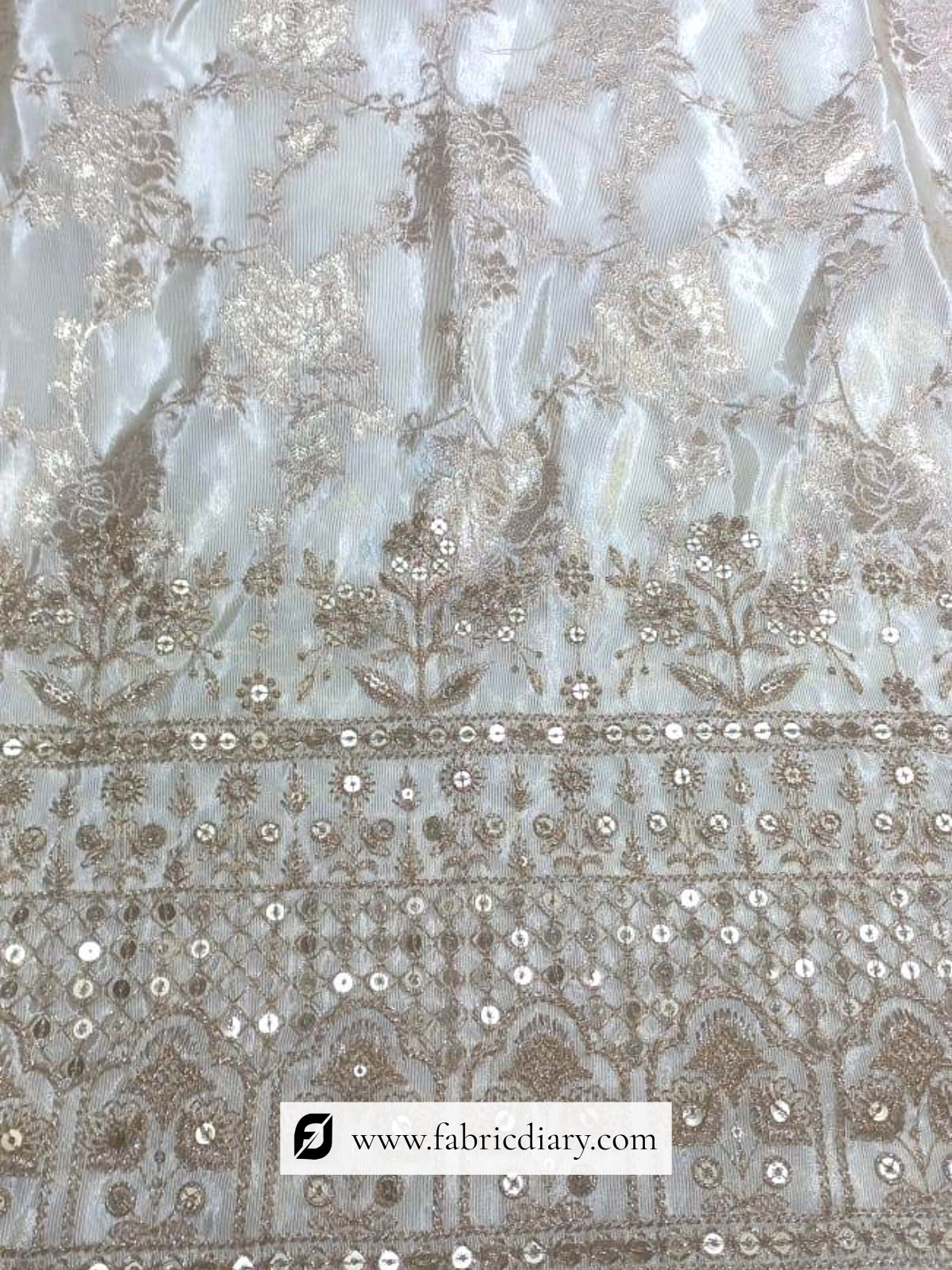 Tissue jacquard with embroidered border work