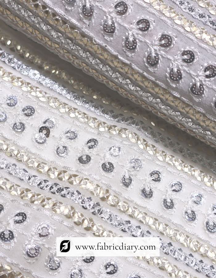 Elegant sequin fabric in gold & silver – perfect for party gowns and sarees