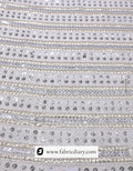 Premium sequin fabric with golden silver finish – for women’s wear worldwide