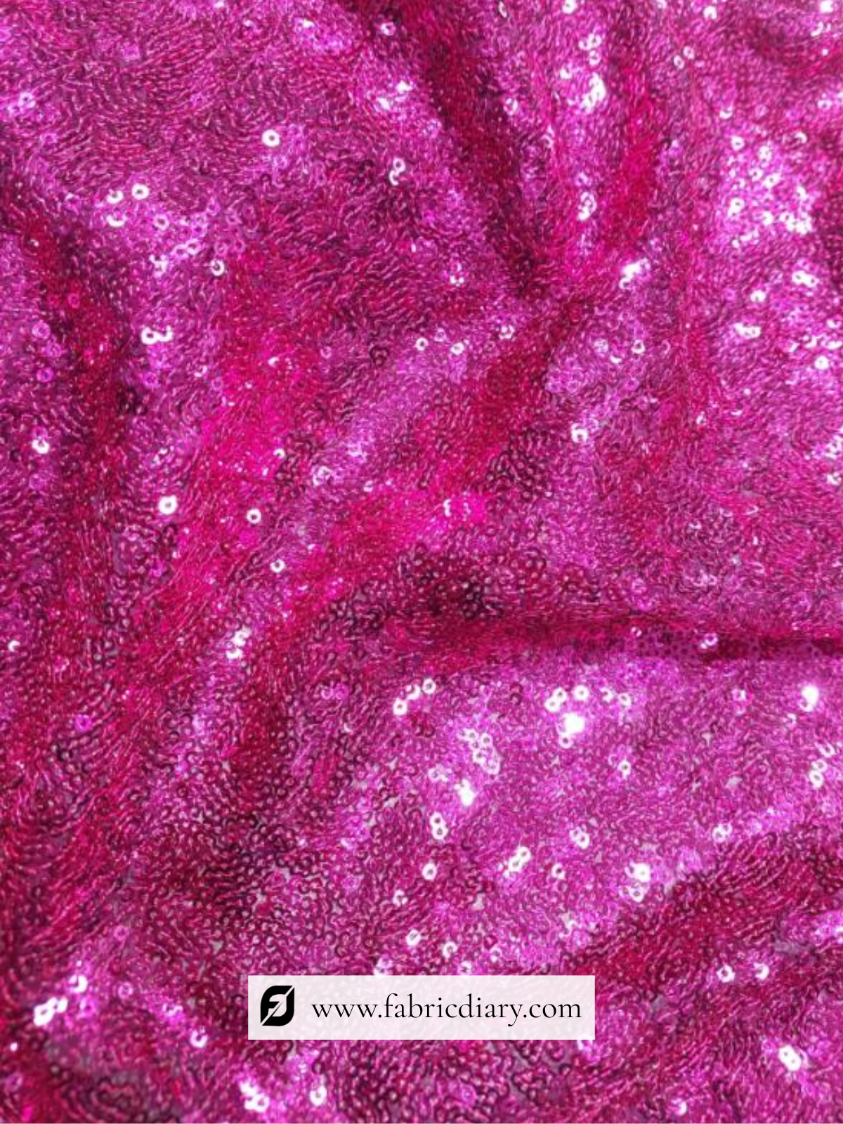 Heavy sequin embroidery fabric in vibrant pink