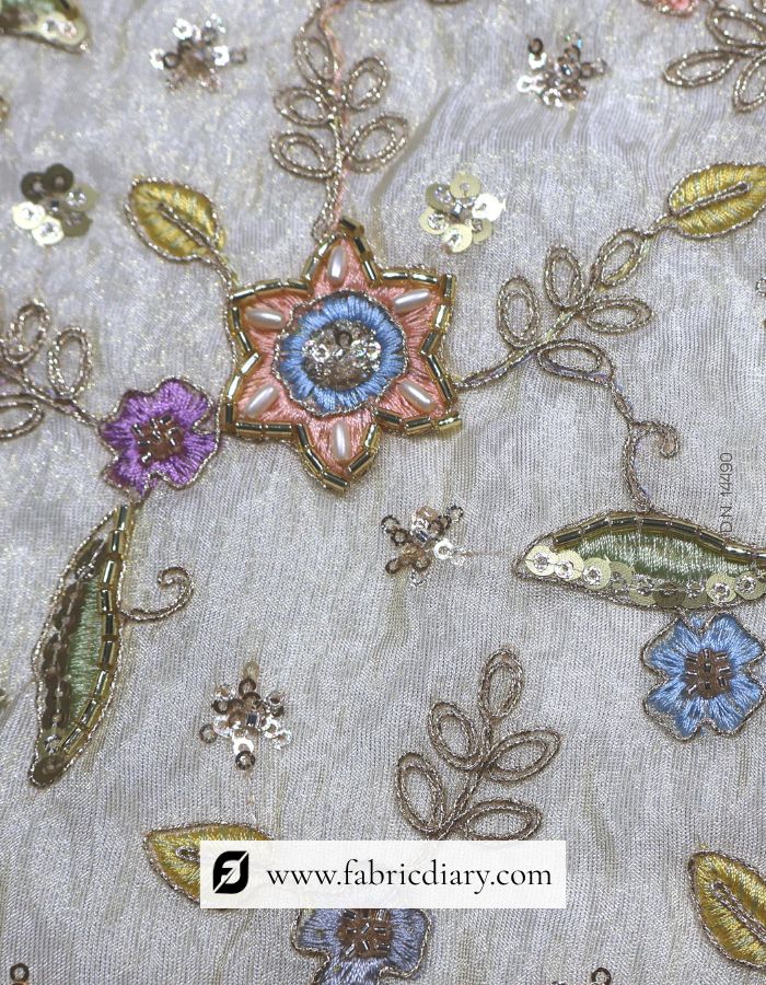Multicolor floral fabric on gold tissue for gowns
