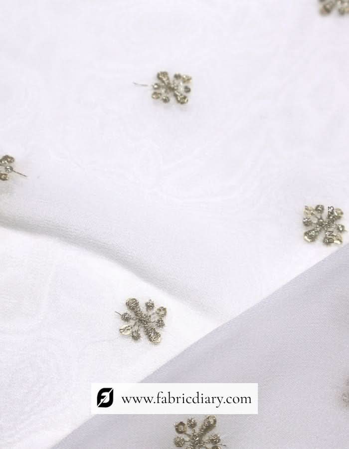 Butti embroidery with zari – traditional designer material for gowns and sarees