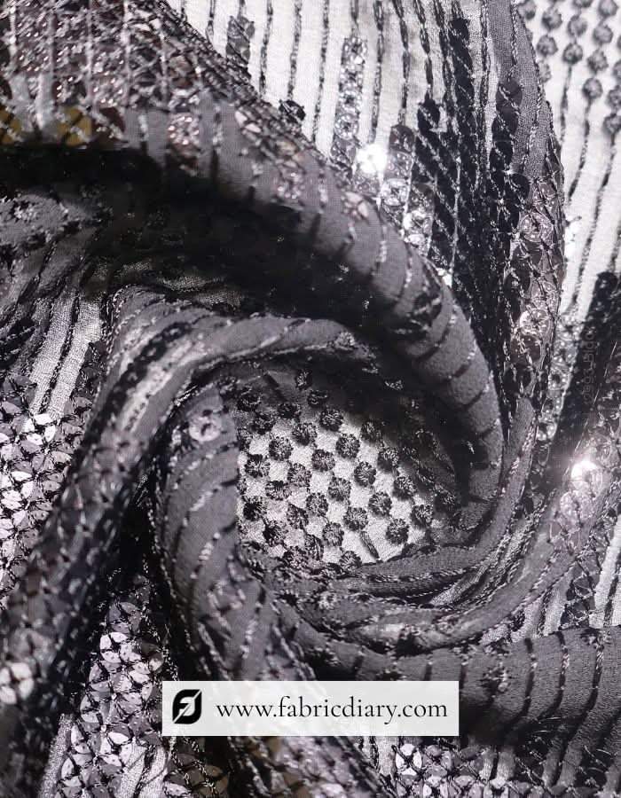 Designer fabric with four-square sequin embroidery