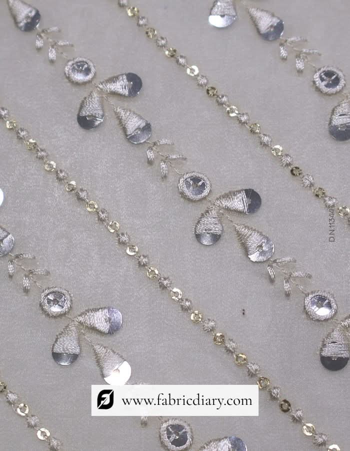 Stylish cross-line embroidered fabric – online bulk supplier for fashion designers