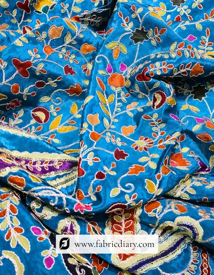 Position print embroidery fabric inspired by Ritu Kumar and Tom Ford