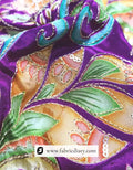 Designer floral position printed fabric on display rack