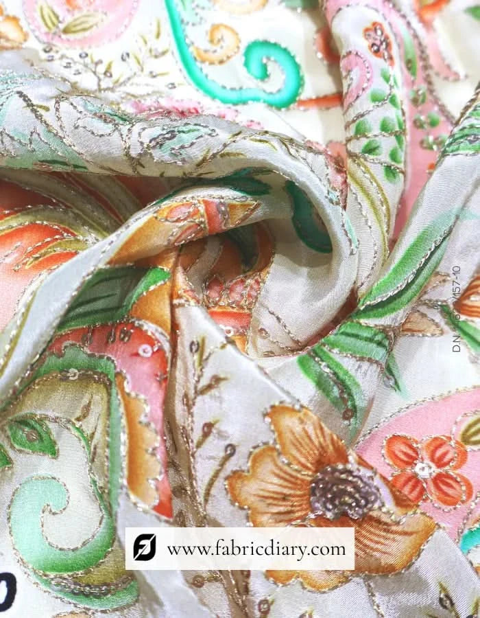 Lovely floral panel print fabric folded neatly on wood
