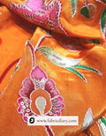 Embroidered grey-orange floral fabric by Fabric Diary