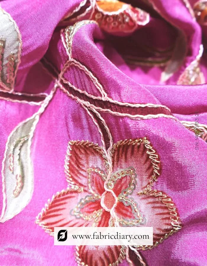  Neon pink floral panel print fabric on tailoring board