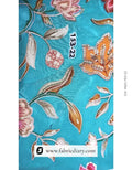  Grey-green floral print fabric roll in store