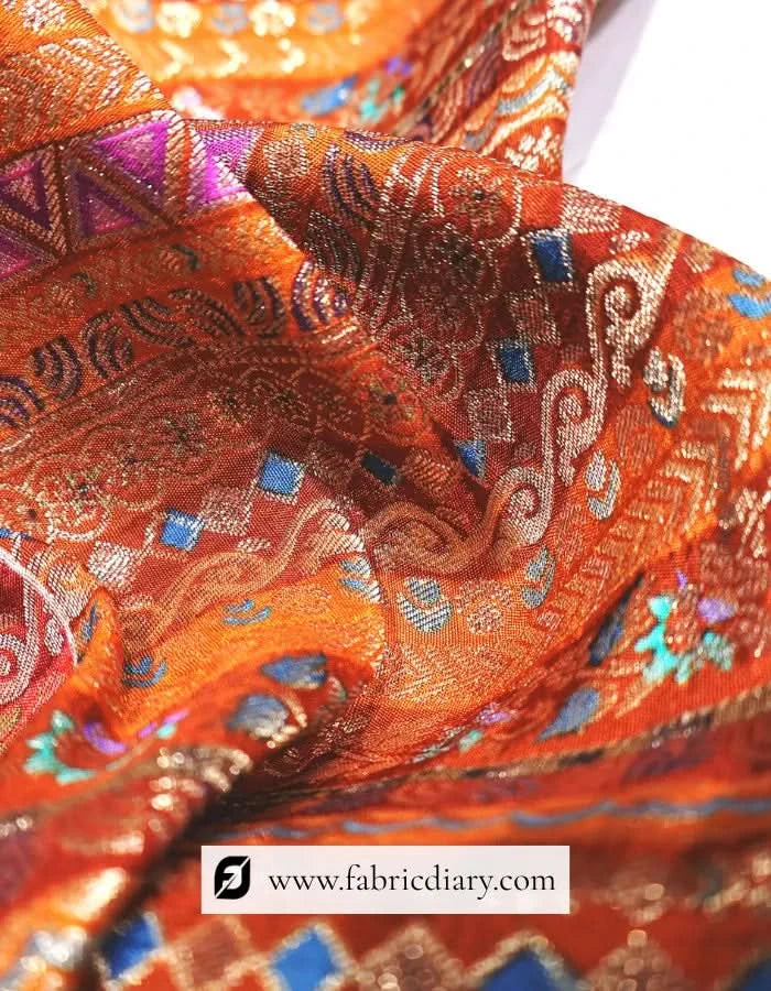 Bright Orange Dola Silk Jacquard Fabric for Wedding Attire – Based in Navi Mumbai